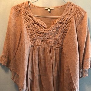 Butterfly arm blouse